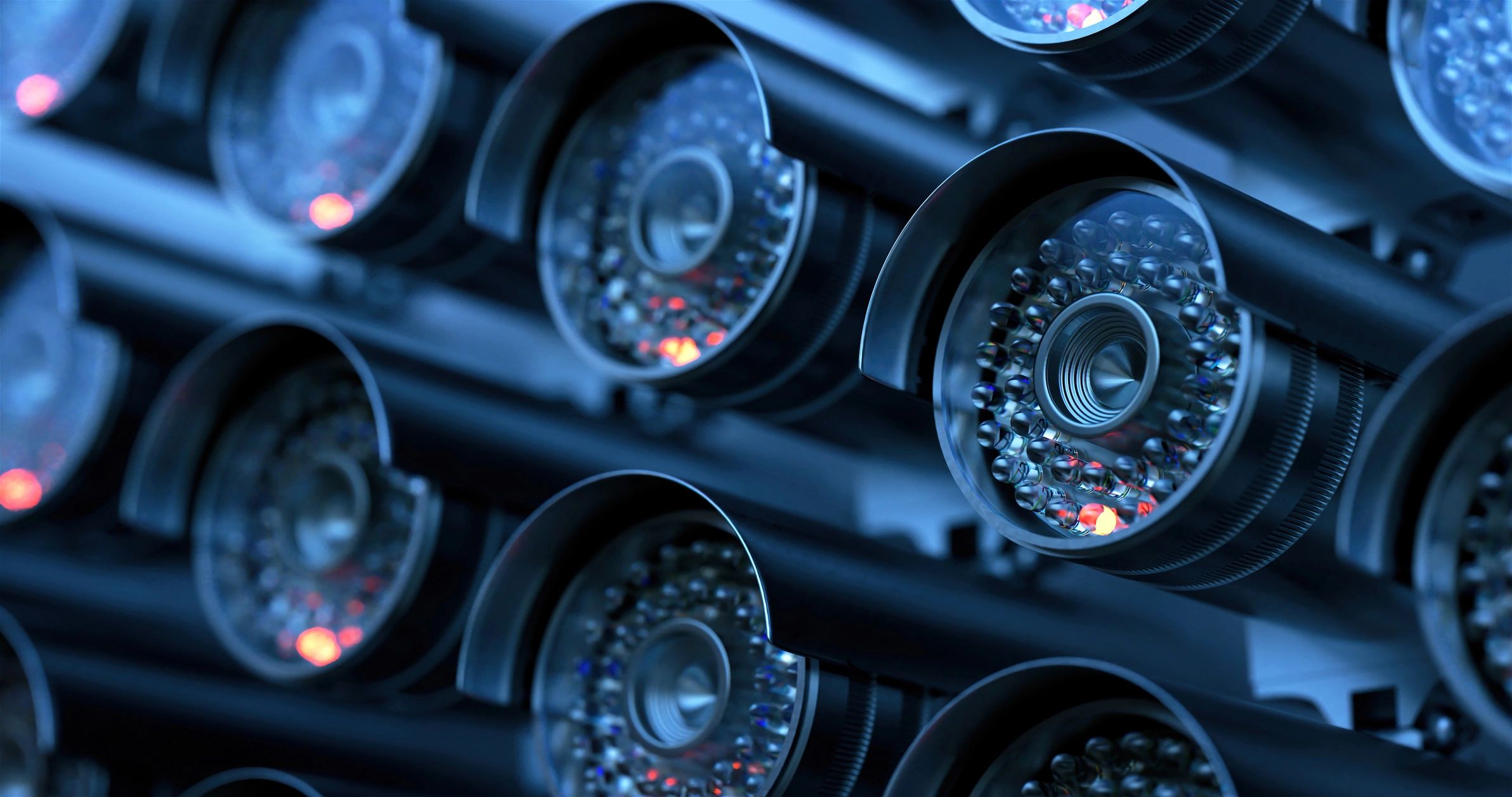 Automated surveillance cameras monitoring a property
